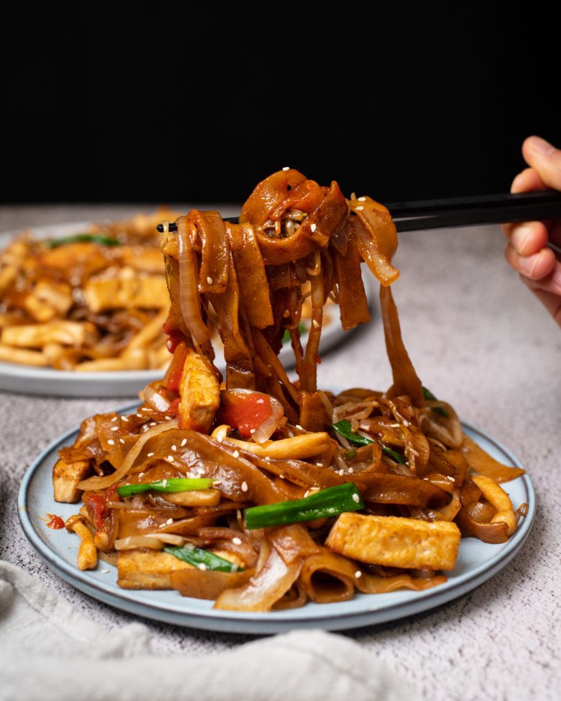 Hong Kong-style vegan chow fun with pan-fried tofu and mushrooms