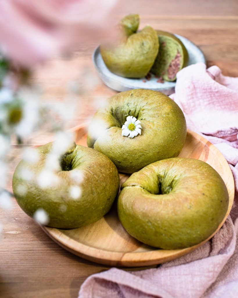 Soft fluffy vegan matcha bagels with red bean paste filling