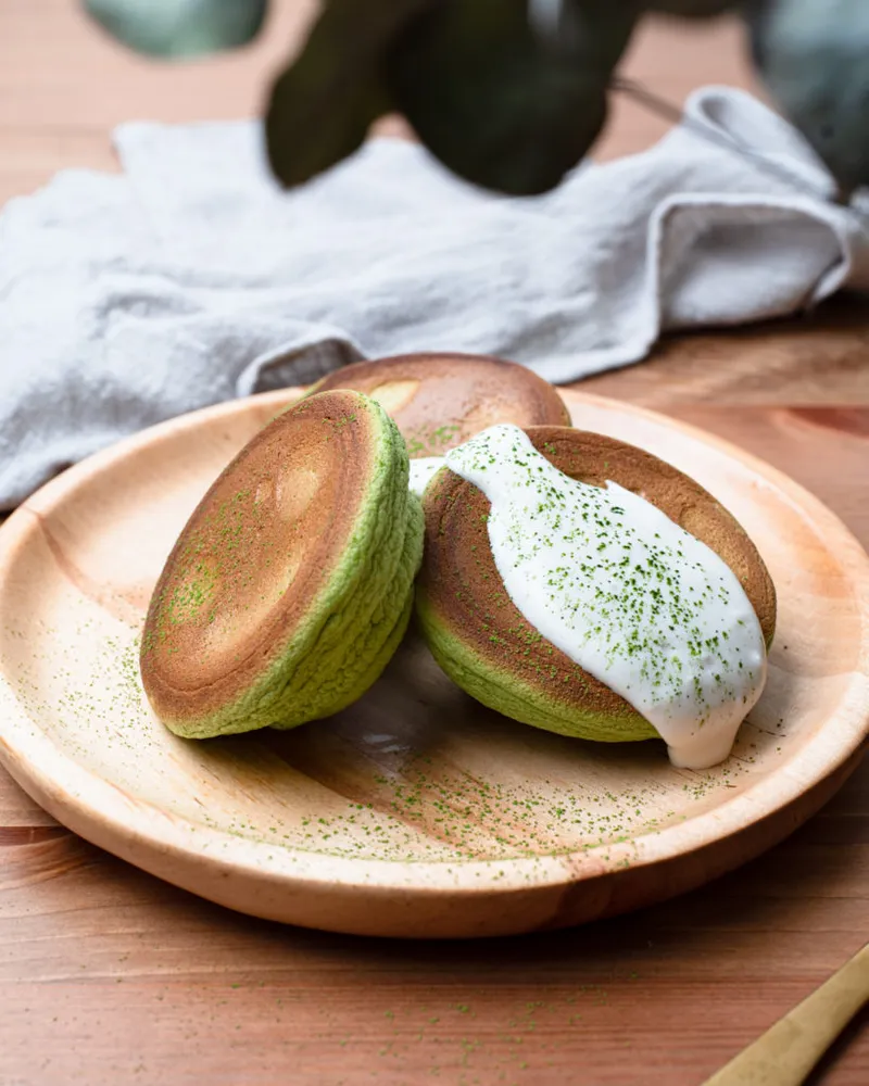 Fluffy keto Japanese souffle pancakes with matcha on a plate